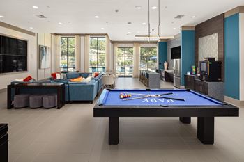 Resident clubroom w/ games & media wall